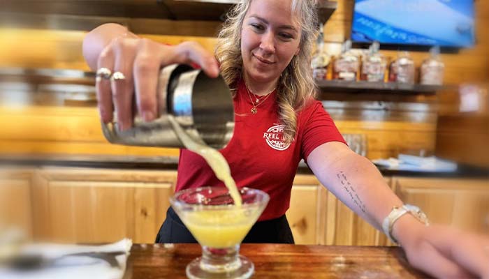 Reel Java Jamestown Kentucky sports bar bartender pours lemon drop drink