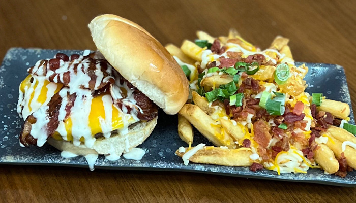 Reel Java Jamestown Kentucky dinner burger with side of loaded French fries